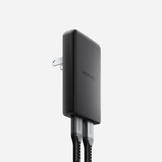 65W Power Adapter with Dual USB-C Ports and Flip-Out Prongs - Side View Detailed