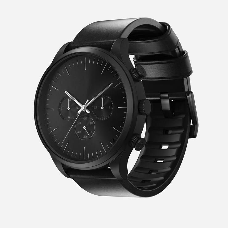 The Nomad Active Band Pro - 22mm Quick Release features black Horween leather and black hardware, combining modern elegance and durability. Its sleek design with a stainless steel buckle is perfect for a contemporary, refined look.
