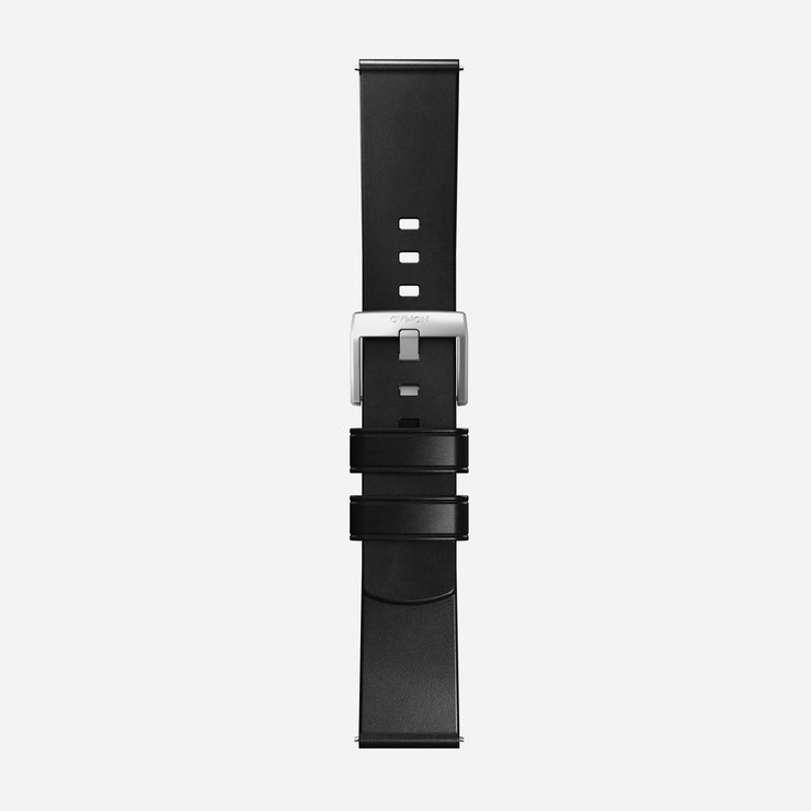The Nomad Active Band Pro - 22mm Quick Release in Black Horween leather with silver hardware is shown vertically on a plain white background.