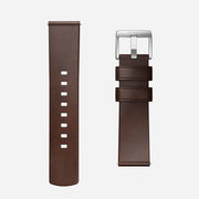 The Nomad Active Band Pro - 22mm Quick Release in Brown Horween leather features silver hardware, a stainless steel buckle, and two-piece design with holes and loops, compatible with 22mm quick release watches.