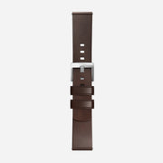 The Nomad Active Band Pro - 22mm Quick Release in Brown Horween leather with silver hardware is shown laid flat on a white background, featuring multiple adjustment holes and two loops near the stainless steel buckle.