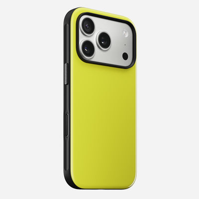 The Nomad Modern Case for iPhone 17 Pro in Volt is shown from the back, featuring a yellow rear, black edges, three camera lenses with a flash in the top corner, and sleek 8ft drop protection.
