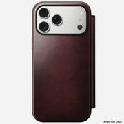 An iPhone 17 Pro Max in a Nomad Modern Leather Folio case, crafted from Burgundy Horween leather, is shown against a white background. "After 100 Days" appears in the lower right corner.