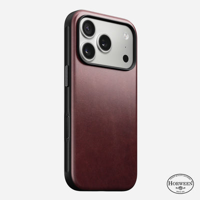 The Nomad Modern Leather Case for iPhone 17 Pro in Burgundy features genuine Horween leather, three rear camera cutouts, the Horween Leather Company logo in the bottom right corner, and is MagSafe charging compatible.