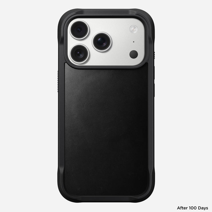 The Nomad Rugged Leather Case in black Horween leather protects the iPhone 17 Pro, shown with three camera lenses on a white background. "After 100 Days" is displayed in the lower right corner.