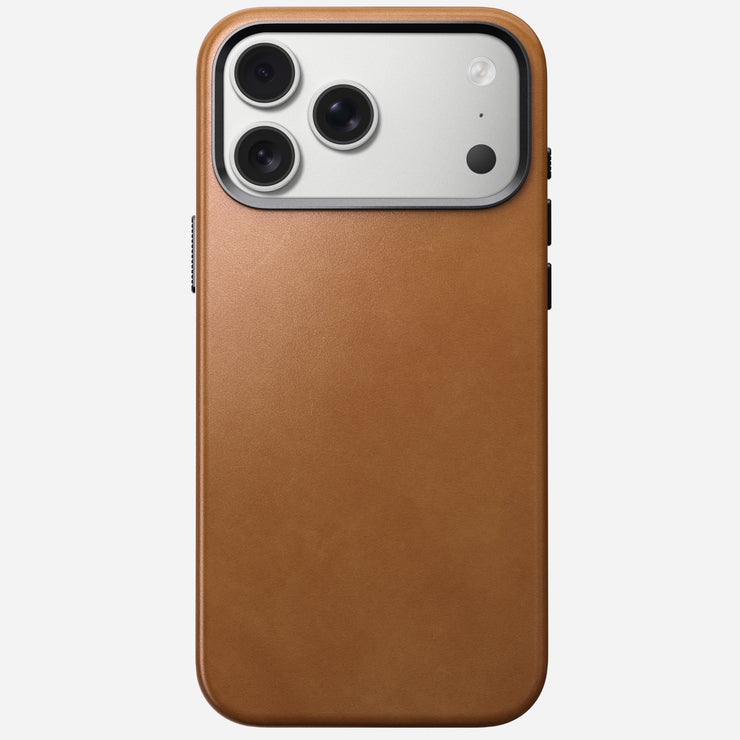 The Nomad Traditional Leather Case in English Tan – C for iPhone 17 Pro Max, shown from the back, features MagSafe compatibility and showcases a brown full-grain leather finish with a silver three-lens camera and flash in the top left.