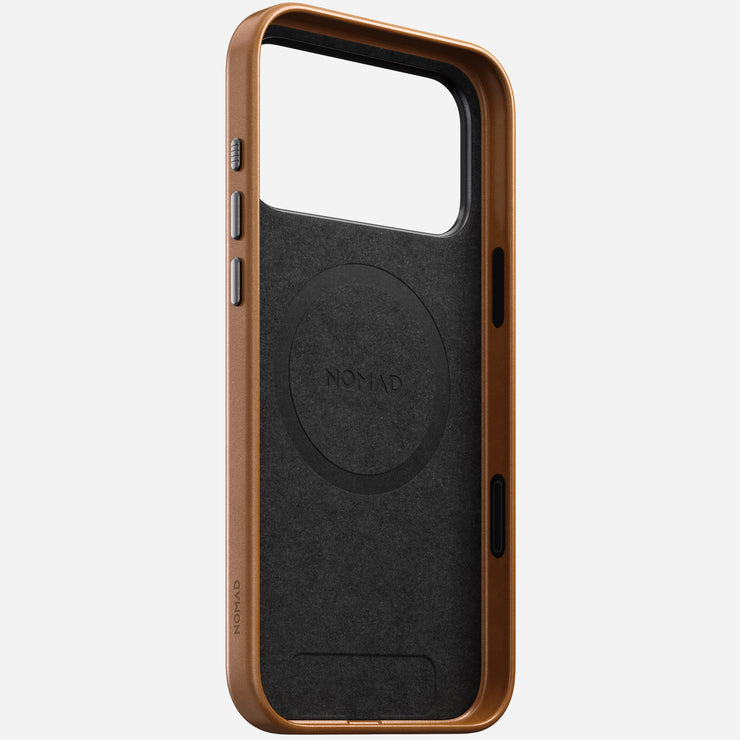 The Nomad Traditional Leather Case for iPhone 17 Pro Max in English Tan features full-grain leather, open front, side button cutouts, and a MagSafe-compatible interior labeled NOMAD, shown upright on a white background.