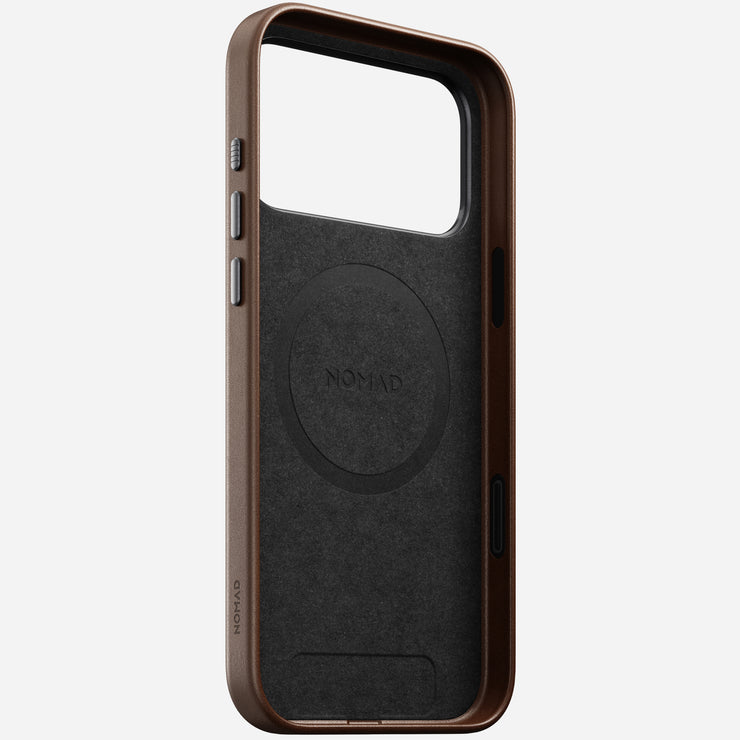 The Nomad Traditional Leather Case for iPhone 17 Pro Max in brown is crafted from full-grain leather with MagSafe, shown upright to display its interior, side buttons, camera control button, and precise camera cutout.