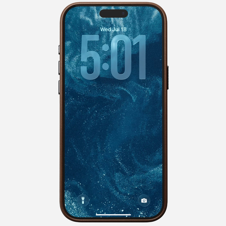 An iPhone 17 Pro Max in a Nomad Traditional Leather Case (Brown) displays a lock screen at 5:01, July 18. The wallpaper is a blue and white abstract swirl, with flashlight and camera icons visible.