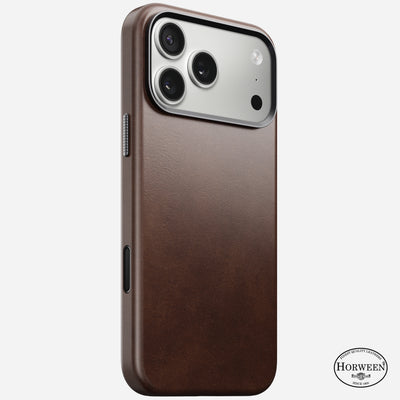 The Nomad Traditional Leather Case for iPhone 17 Pro Max in Rustic Brown features Horween leather, precise camera and button cutouts, a smooth finish, MagSafe compatibility, and a Horween stamp in the bottom right corner.