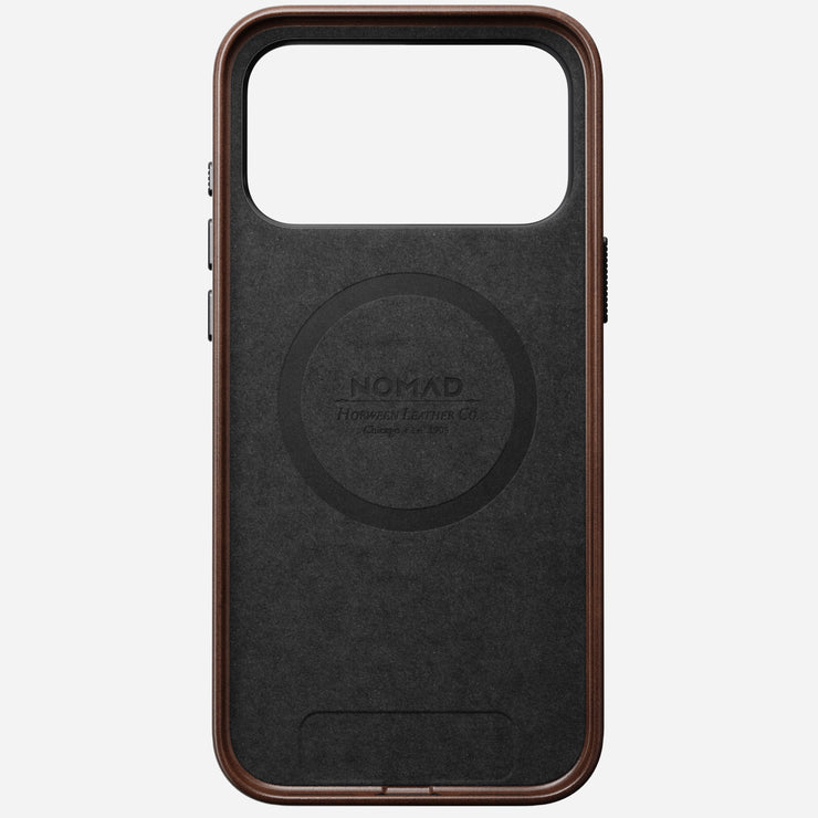 The Nomad Traditional Leather Case for iPhone 17 Pro Max in Rustic Brown is crafted from Horween leather, features a large rectangular camera cutout, a MagSafe alignment mark for wireless charging, and is branded with NOMAD and Horween Leather Co.