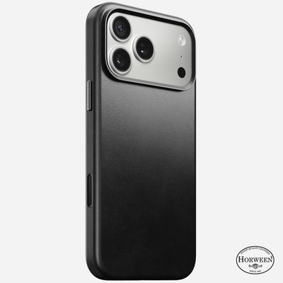 The Nomad Traditional Leather Case for iPhone 17 Pro Max features sleek black Horween leather, visible camera lenses and flash, the Horween logo at the lower right, and MagSafe compatibility for effortless wireless charging.