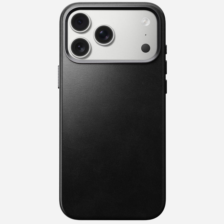 The Nomad Traditional Leather Case for iPhone 17 Pro Max in black Horween leather is shown MagSafe compatible, with a silver camera module featuring three large lenses and a flash, set against a light gray background.