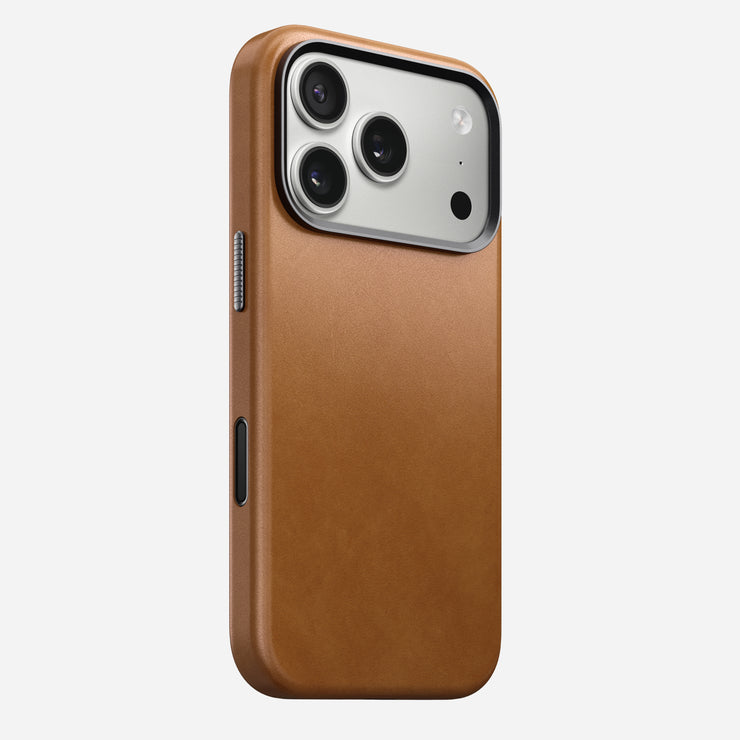 The Nomad Traditional Leather Case in English Tan for iPhone 17 Pro, shown upright against a white background, features sustainably sourced full-grain leather, MagSafe compatibility, visible side buttons, and a triple camera cutout.
