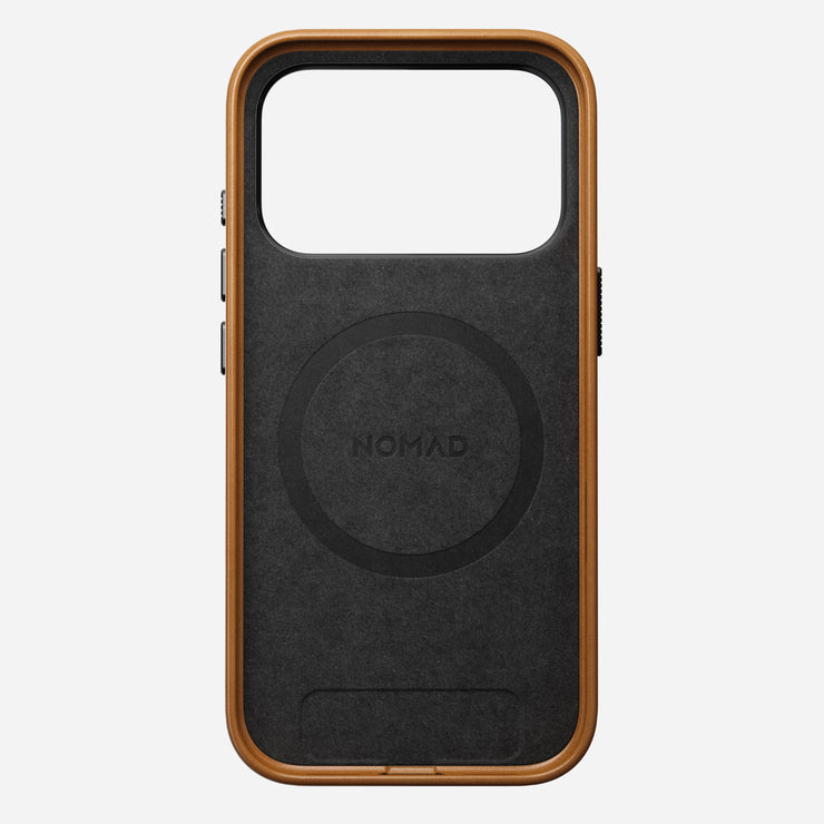 The Nomad Traditional Leather Case for iPhone 17 Pro in English Tan features a sustainably sourced full-grain leather frame, black back, and “NOMAD” branding at the center, shown on a plain white background. MagSafe-compatible.