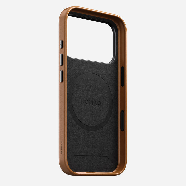 The Nomad Traditional Leather Case for iPhone 17 Pro in English Tan combines brown and black full-grain leather, rounded edges, side button covers, a circular MagSafe logo inside, and Nomad branding on the interior and side.