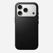 The Nomad Traditional Leather Case for iPhone 17 Pro in black, shown with three rear cameras and a flash, is displayed against a plain white background.