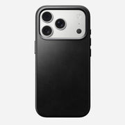 The Nomad Traditional Leather Case for iPhone 17 Pro (Black, Horween) showcases a triple-lens camera with flash in the top left, all in a sleek MagSafe-compatible full-wrap design against a plain light background.