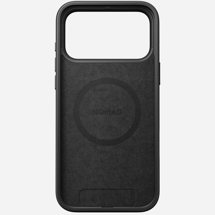 The Nomad Modern Case - iPhone 17 Pro Max in Vulcan Black features a textured back, open top for the camera, circular MagSafe outline, and a tough TPU bumper with 8ft drop protection. Shown empty with no phone inside.