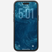 The Nomad Modern Case in Vulcan Black protects an iPhone 17 Pro Max, shown with a dark blue swirl wallpaper, the time 5:01, date Wed Jul 18, and flashlight plus camera icons at the bottom of its impact-resistant TPU bumper.