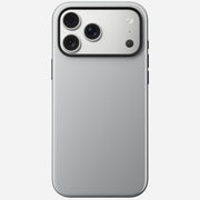 The Nomad Modern Case for iPhone 17 Pro Max in Lunar Gray is shown from the back, highlighting its matte silver finish, triple-lens camera module with flash and sensor in the top left corner, and MagSafe compatibility.