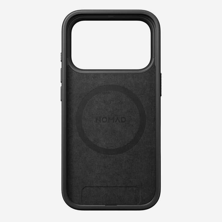 The Nomad Modern Case - iPhone 17 Pro in Vulcan Black is a rectangular case with a large camera cutout, MagSafe compatibility, and a TPU bumper for drop protection. "NOMAD" is centered on the light gray background. Interior has a MagSafe alignment mark.