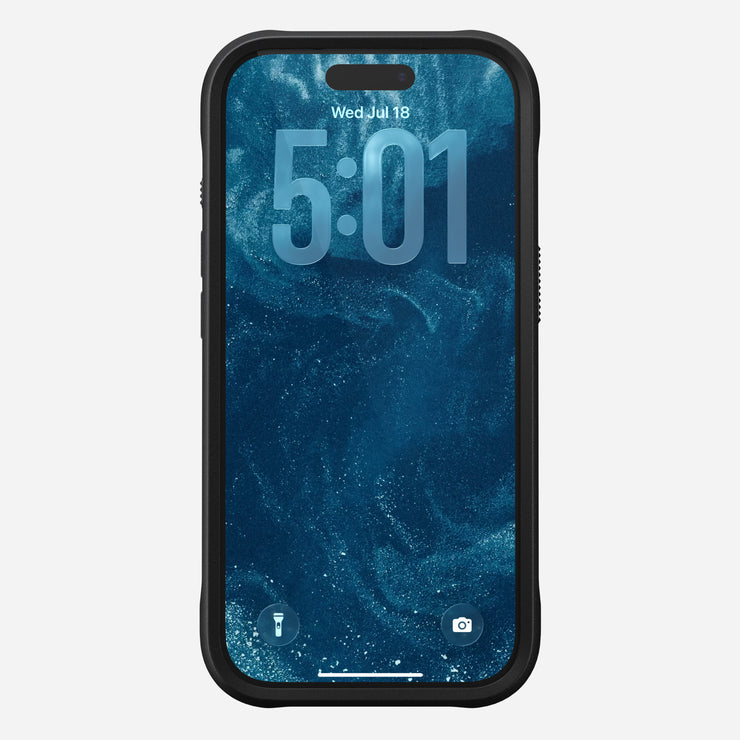 A Nomad Rugged Case in Black shields the iPhone 17 Pro, shown with a dark blue swirl wallpaper and 5:01 lock screen. MagSafe compatible TPU bumpers offer style and protection; flashlight and camera icons appear at the screen’s bottom.