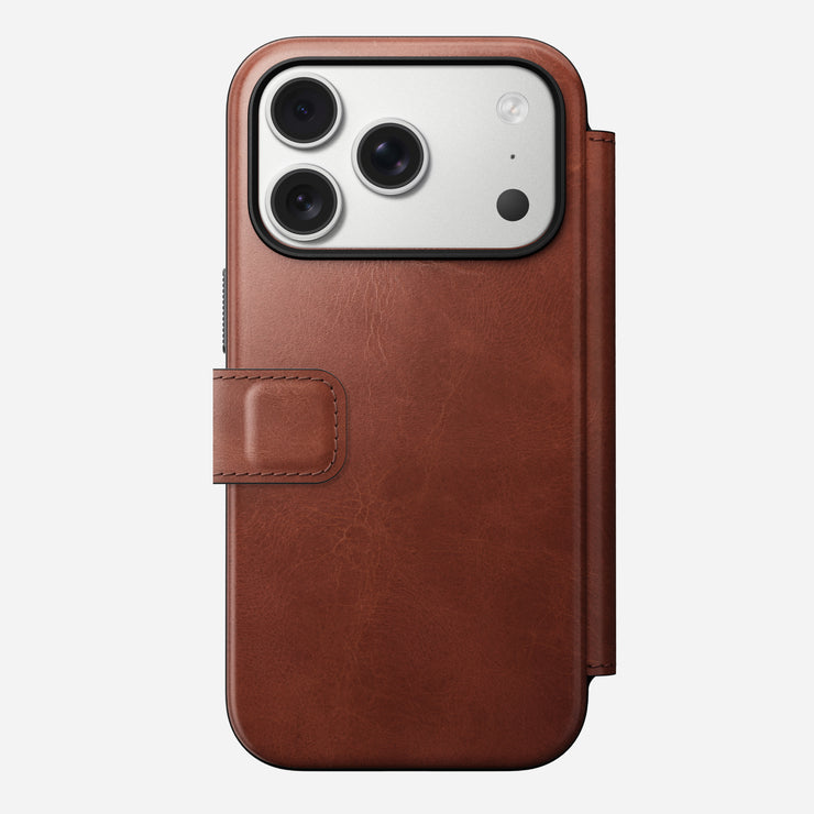 The Nomad Modern Leather Folio - iPhone 17 Pro in Olde Dublin Horween leather features a visible camera module, magnetic clasp, MagSafe compatibility, and 8ft drop protection, shown against a plain white background.