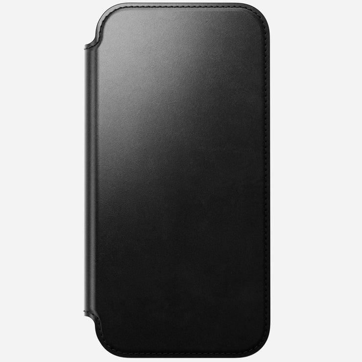 The Nomad Modern Leather Folio for iPhone 17 Pro Max features closed black Horween leather, rounded corners, subtle edge stitching, and a sleek minimalist design, shown against a light background.