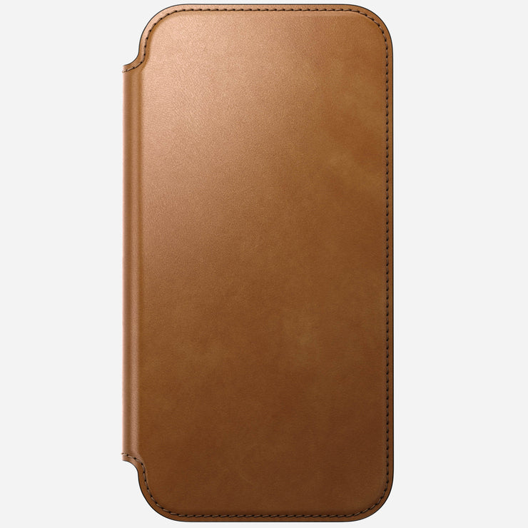 The Nomad Modern Leather Folio for iPhone 17 Pro Max in English Tan-C is shown closed, featuring full-grain leather and neat edge stitching, viewed from the front against a plain white background.