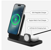 The Nomad Stand One Max - MagSafe | Carbide (2nd Gen) is a black 3-in-1 charging hub and iPhone StandBy dock with labeled spots for a 15W MagSafe charger, Apple Watch fast charger, and AirPods Qi charging spot.