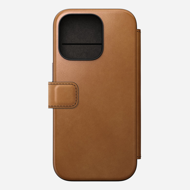 Main view of Modern Leather Folio for iPhone 16 Pro in English Tan-C by Nomad Leather. Highlights full-grain leather, card slots, cash slot, removable magnetic clasp, and 8ft drop protection. Compatible with MagSafe & wireless charging