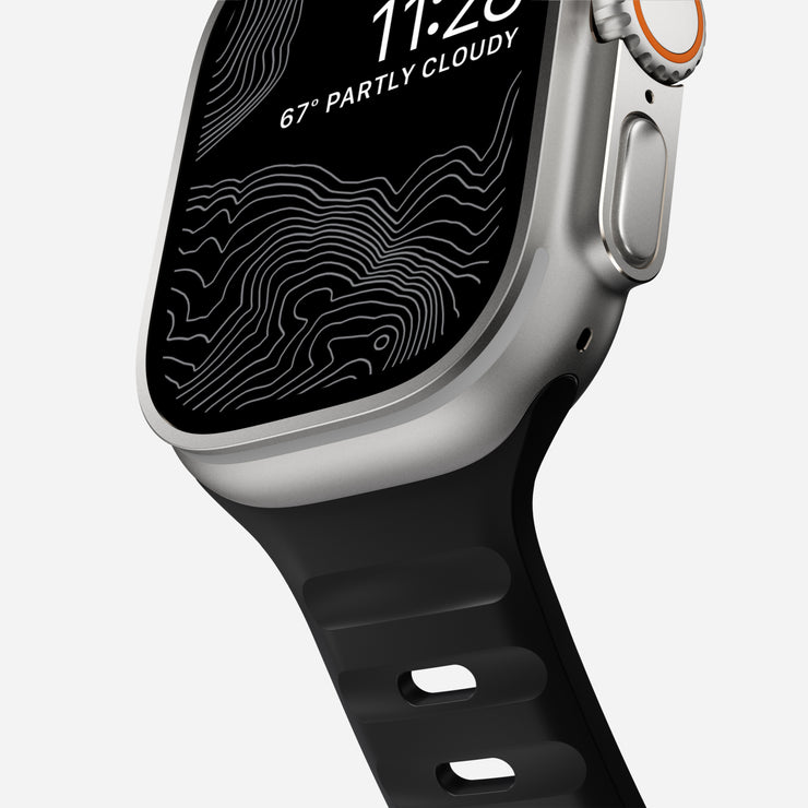 Close-up view of the Sport Band for 45mm Apple Watch in Black, highlighting the texture of the FKM fluoroelastomer rubber