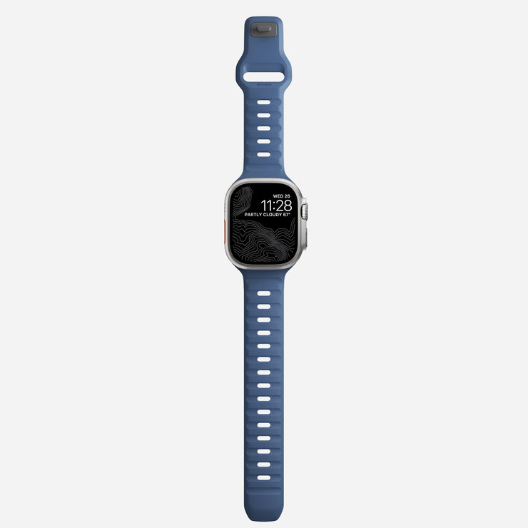 Full view of the 45mm Naval Blue Sport Band for Apple Watch, demonstrating its seamless design and athletic appeal