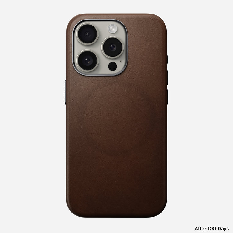 Full front view of the Traditional Leather Case for iPhone 15 Pro in Brown, highlighting the sophisticated leather wrap and anodized buttons