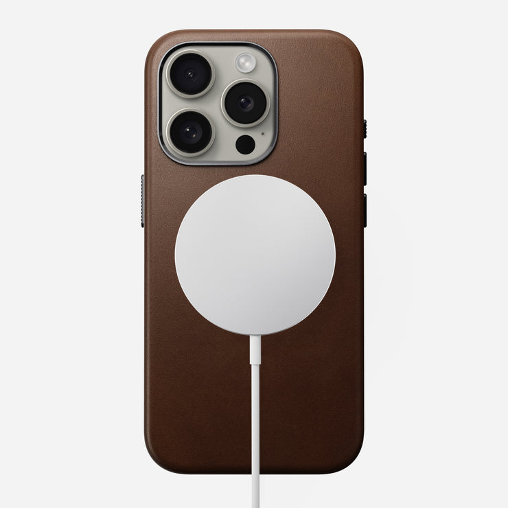 Back view of the Traditional Leather Case for iPhone 15 Pro in Brown, featuring the MagSafe ring for wireless charging