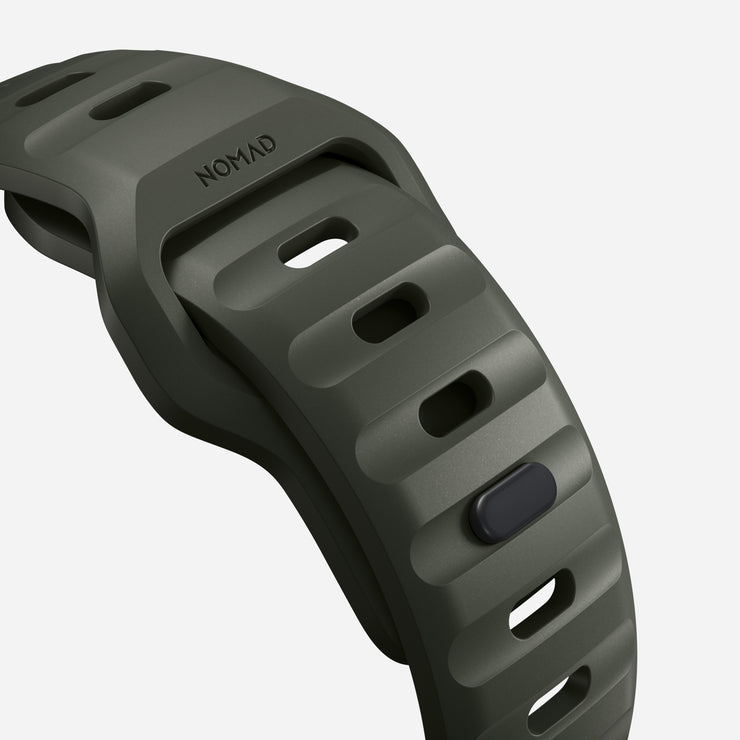  Close-up view of the Ash Green Sport Band, highlighting the ventilation channels and durable rubber