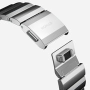 Close-up of the silver hardware Steel Band, focusing on the magnetic clasp and durable 316L stainless steel construction