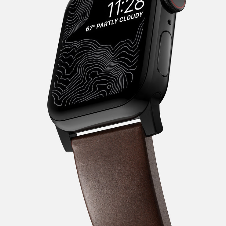 Close-up view of the Modern Band for Apple Watch, highlighting the detailed stitching and texture of Rustic Brown Horween leather.