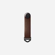 Front view of the Orbit Key Organizer in Rustic Brown, emphasizing the modern stitchless construction