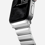 Close-up of the Steel Band for Apple Watch in silver, highlighting the fine detailing and custom fit