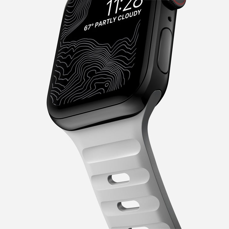 Close-up view of the Sport Band for 41mm Apple Watch in Lunar Gray, highlighting the texture and detail of the FKM fluoroelastomer rubber