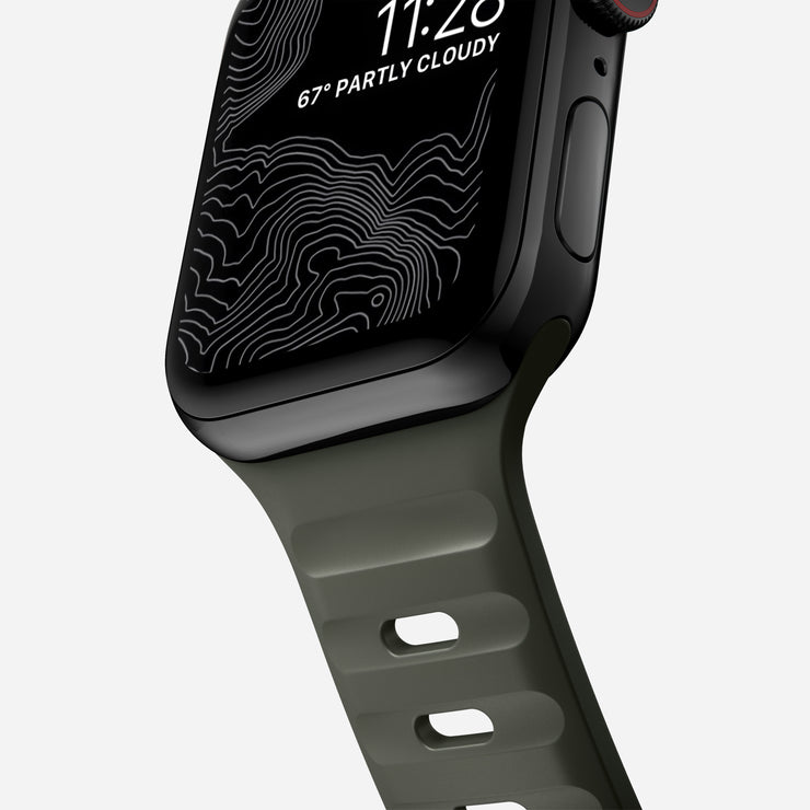  Close-up of the 45mm Ash Green Sport Band for Apple Watch, focusing on the aluminum pin and breathable interior channels