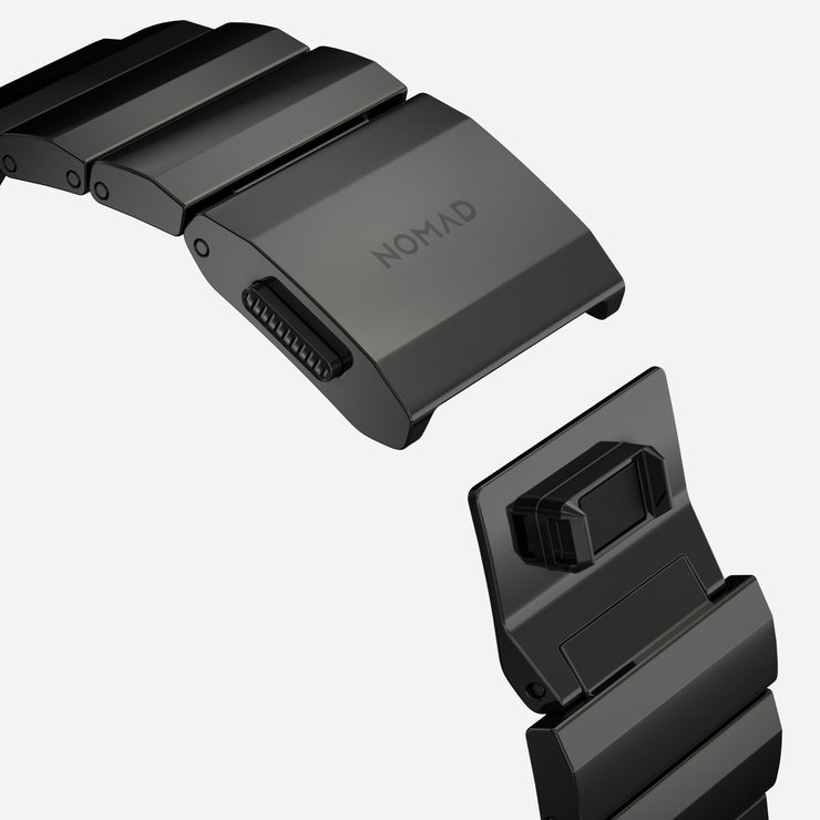 Close-up view of the Steel Band for Apple Watch in graphite, featuring the precision-engineered links and DLC scratch-resistant coating